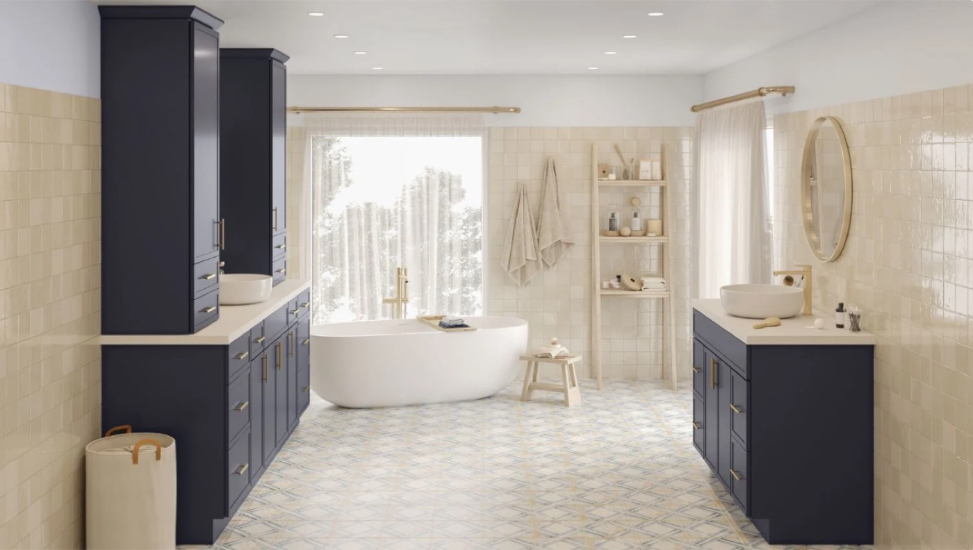 Navy bathroom with freestanding tub and double vanity by Create More Space