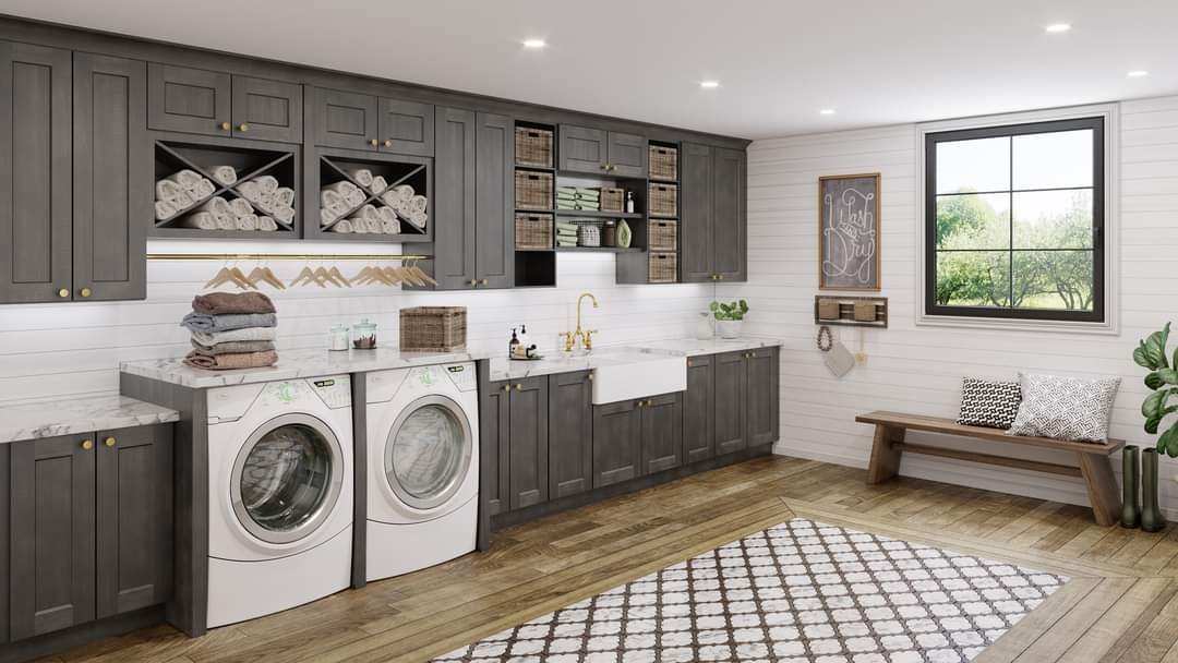 Custom laundry room with farmhouse sink, folding bench and full cabinetry