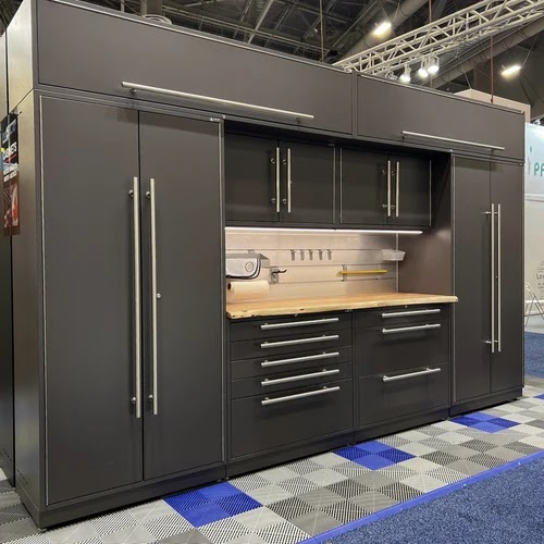 Charcoal metal garage cabinetry with butcher-block top