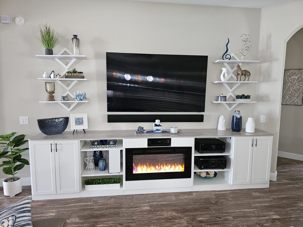 Entertainment center with fireplace and cabinetry